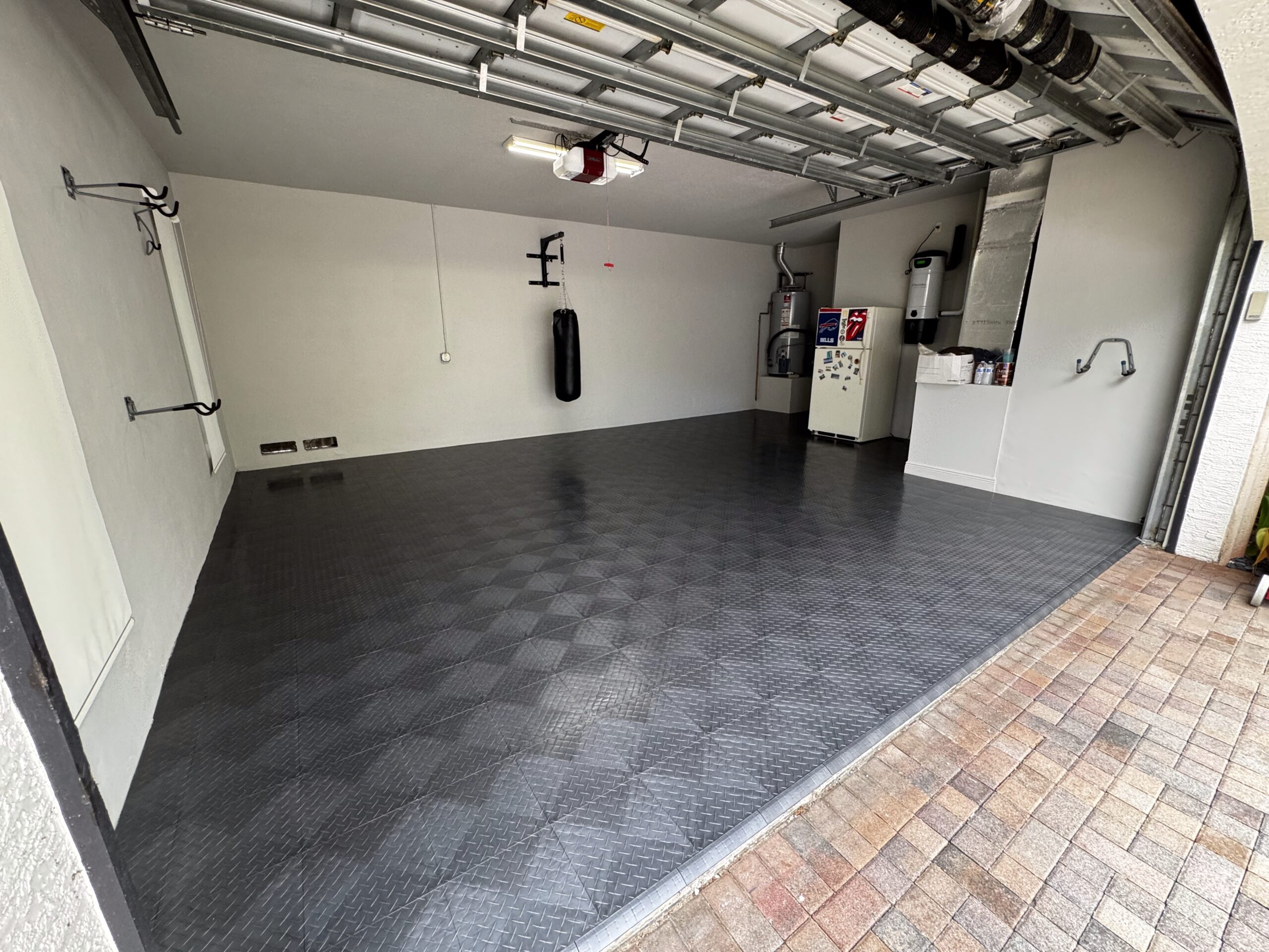 Why Ventilated Modular Garage Flooring Is Better Than Epoxy in South Florida